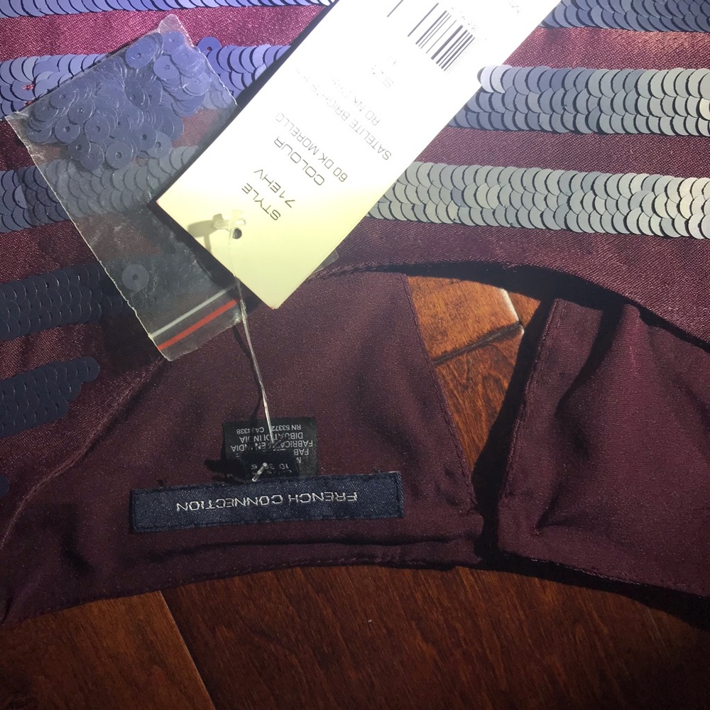 Amazing dress never used can fit size 4